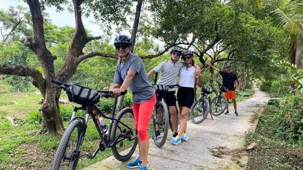 1784856336_mekong-delta-bike-tours-pedal-along-canals-tropical-orchards.jpg